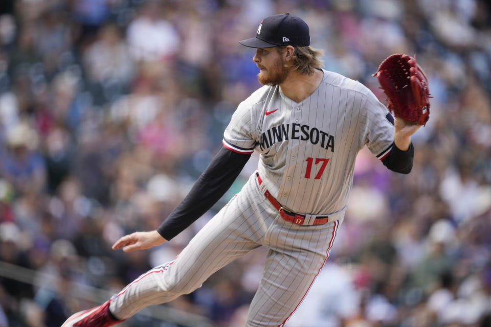 Minnesota Twins starting pitcher Bailey Ober works against the Colorado Rockies in the fourth inning of a baseball game, Sunday, Oct. 1, 2023, in Denver. (AP Photo/David Zalubowski)