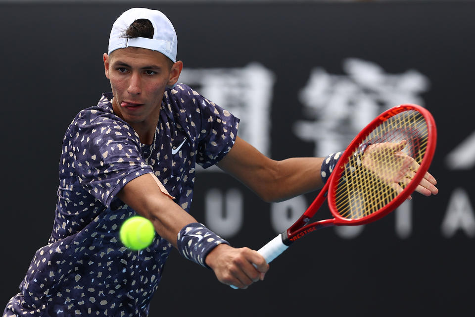 Alexei Popyrin of Australia plays a backhand during his Men's Singles second round match against Jaume Munar of Spain on day four of the 2020 Australian Open at Melbourne Park on January 23, 2020 in Melbourne, Australia. (Photo by Cameron Spencer/Getty Images)