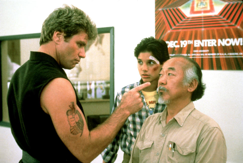 Martin Kove, Macchio and Pat Morita in The Karate Kid. (Photo: Columbia/Courtesy Everett Collection)