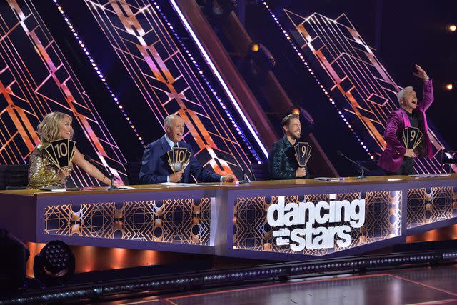 <p>Eric McCandless/ABC via Getty Images</p> Len Goodman on Dancing with the Stars besides Carrie Ann Inaba, Derek Hough and Bruno Tonioli