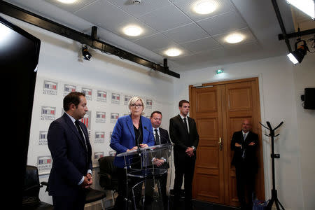 Marine Le Pen, member of parliament and head of France's far-right National Front (FN) political party, attends a news conference on the state of emergency bill ahead of the extraordinary parliamentary session opening in Paris, France, September 25, 2017. REUTERS/Benoit Tessier