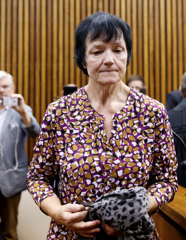 FILE PHOTO: Britta Nielsen, a Danish woman accused of embezzling 117 million crowns ($17 million) of Danish government funds, leaves after a court appearance at Randburg Magistrates Court, South Africa