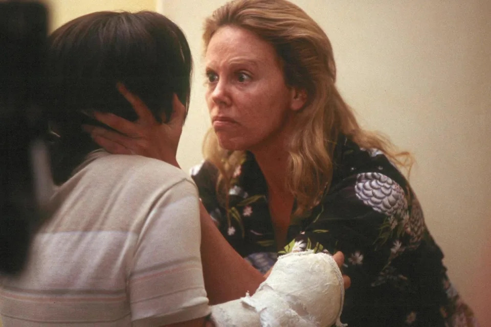 Theron (right) in her Oscar-winning role as Aileen Wuornos and Christina Ricci as Selby Wall in 2004’s Monster (PA)