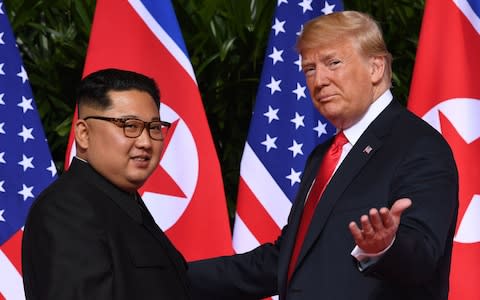President Trump with Kim Jong-un - Credit: Saul Loeb/AFP