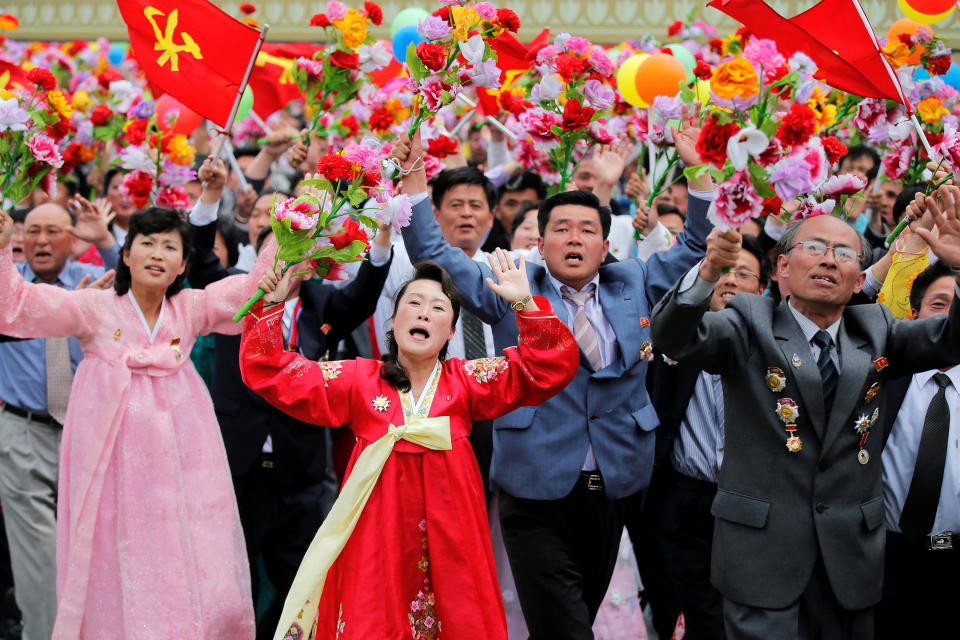 People react as they see North Korean leader Kim Jong Un during a mass rally and parade in the capital's main ceremonial square, a day after the ruling party wrapped up its first congress in 36 years by elevating him to party chairman, in Pyongyang, North Korea, May 10, 2016.  REUTERS/Damir Sagolj     TPX IMAGES OF THE DAY     