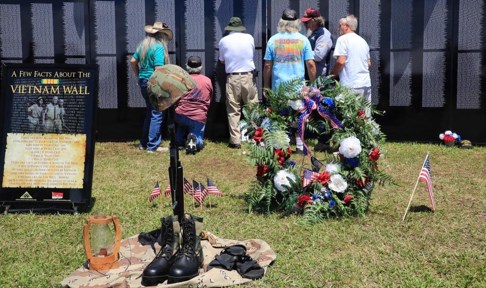 A replica of the wall at the Vietnam Veterans Memorial in Washington, D.C., was a popular stop for those attending the Heroes Honor Festival at Daytona International Speedway in Daytona Beach on Saturday.
