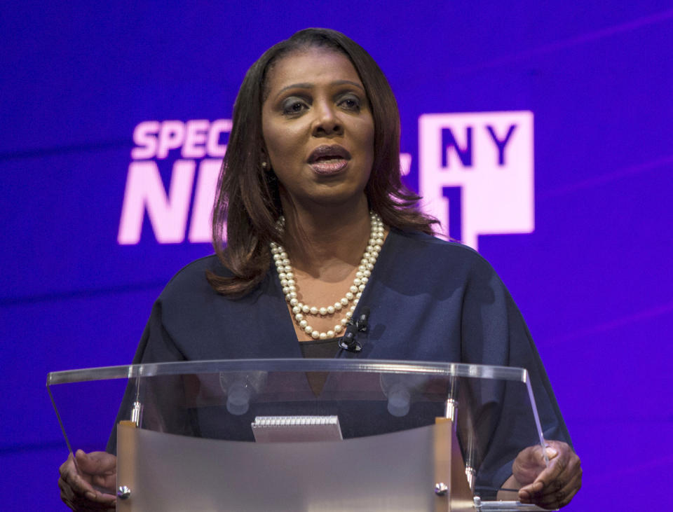 FILE - In this Aug. 28, 2018, file photo, candidate Letitia James stands at the podium during a debate by the Democratic candidates for New York State Attorney General at John Jay College of Criminal Justice in New York. The four candidates in the tightly contested primary, Zephyr Teachout, James, U.S. Rep. Sean Patrick Maloney and Leecia Eve have all vowed to be a legal thorn in Republican President Donald Trump's side, opposing his policies on immigration and the environment. And the winner will inherit several pending lawsuits filed by the state that challenge Trump's policies and accuse his charitable foundation of breaking the law. (Holly Pickett/The New York Times via AP, Pool, File)