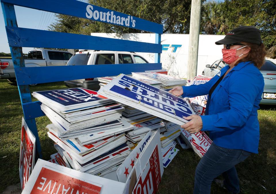 Nancy Vaughn, a member of the League of Women Voters, drops off campaign signs in 2020. The project will continue with a collection at the Volusia County Fairgrounds on Nov. 19 and 20.