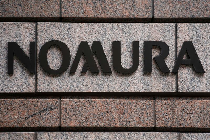 FILE PHOTO: A Nomura logo is pictured at the Japanese company's office in the Manhattan borough of New York City