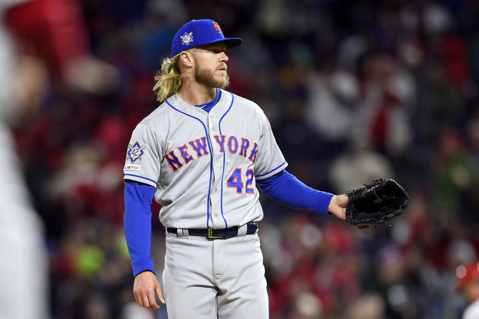 New York Mets starting pitcher Noah Syndergaard in action during a baseball game against the Philadelphia Phillies, Monday, April 15, 2019, in Philadelphia. (AP Photo/Derik Hamilton)