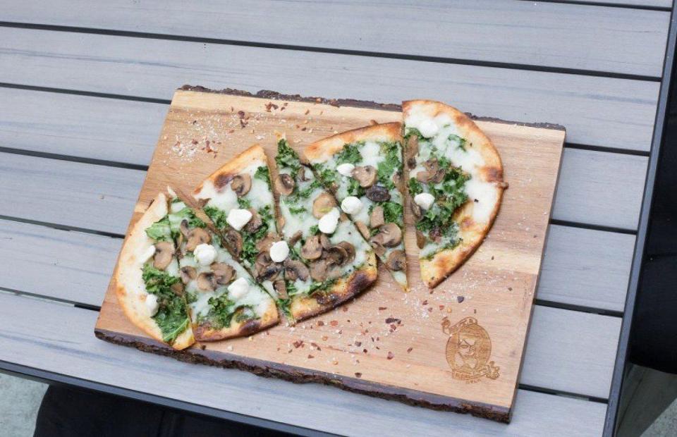 <p>Everyone loves a well-composed flatbread: They're easy to eat and are totally shareable. Flatbreads are thinner and lighter than traditional pizzas, containing fewer calories and saturated fat. Fresh kale and mushrooms give this flatbread a hearty texture and earthy taste. A faint coating of pesto makes this an ideal spring appetizer.</p><p><a href="http://www.thedailymeal.com/recipes/mushroom-flatbread-recipe" rel="nofollow noopener" target="_blank" data-ylk="slk:For the Mushroom Flatbread recipe, click here.;elm:context_link;itc:0;sec:content-canvas" class="link "><b>For the Mushroom Flatbread recipe, click here.</b></a></p>