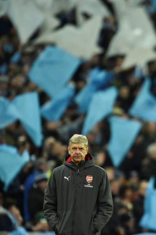 Feeling blue: Arsenal manager Arsene Wenger