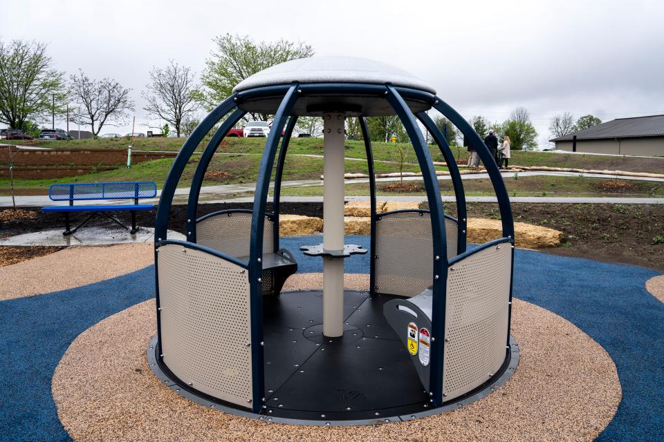 A wheelchair accessible merry-go-round at North Shore Recreation Area at Easter Lake Park on Thursday, May 2, 2024, in Des Moines.