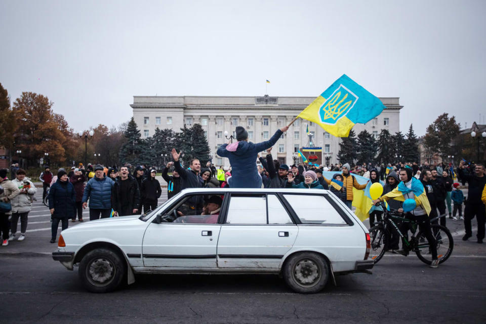 <div class="inline-image__caption"><p>A woman with Ukrainian flag sitting on atop a car during the celebration of the city's liberation on Nov. 12, 2022 in Kherson, Ukraine.</p></div> <div class="inline-image__credit">Yevhenii Zavhorodnii/Global Images Ukraine via Getty Images</div>