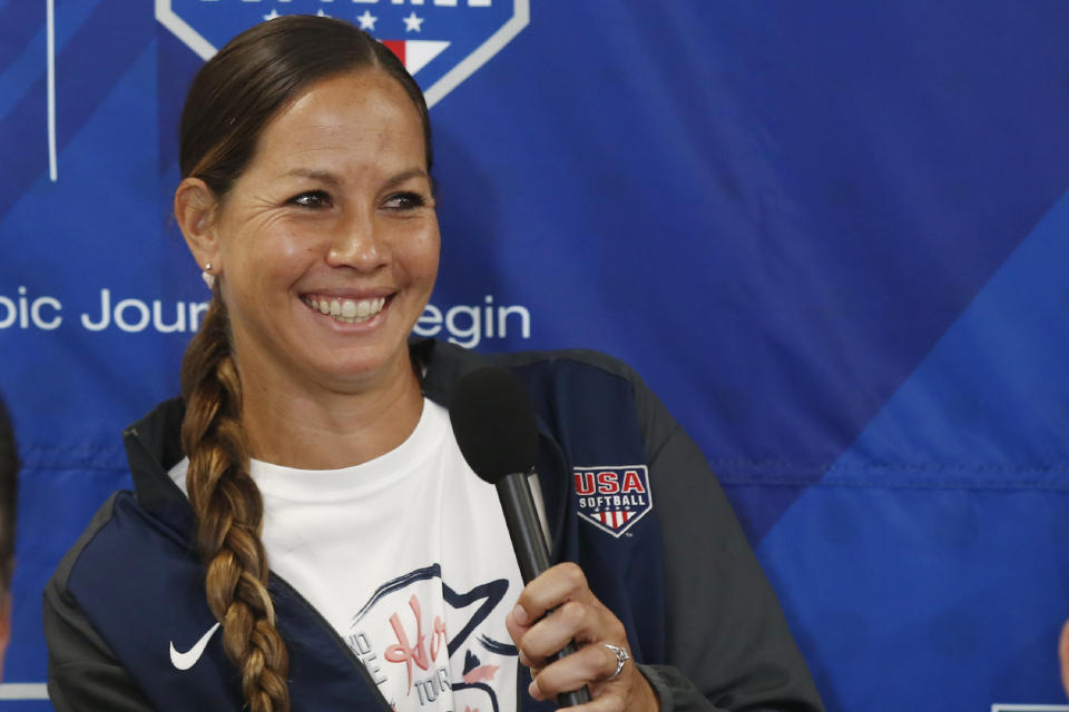 FILE - In this Oct. 8, 2019, file photo, pitcher Cat Osterman smiles as she answers a question during a news conference to announce the USA Softball 2020 Women's Olympic Team in Oklahoma City. Osterman is the first Athletes Unlimited softball champion. The league crowned her its individual champion on Monday, Sept. 29, 2020, based on points scored in games played during a five-week season played in a bubble at a sports complex in Rosemont, Ill. The 37-year-old left-hander compiled 2,408 points, followed by Jessica Warren, Victoria Hayward and Erika Piancastelli. (AP Photo/Sue Ogrocki, File)