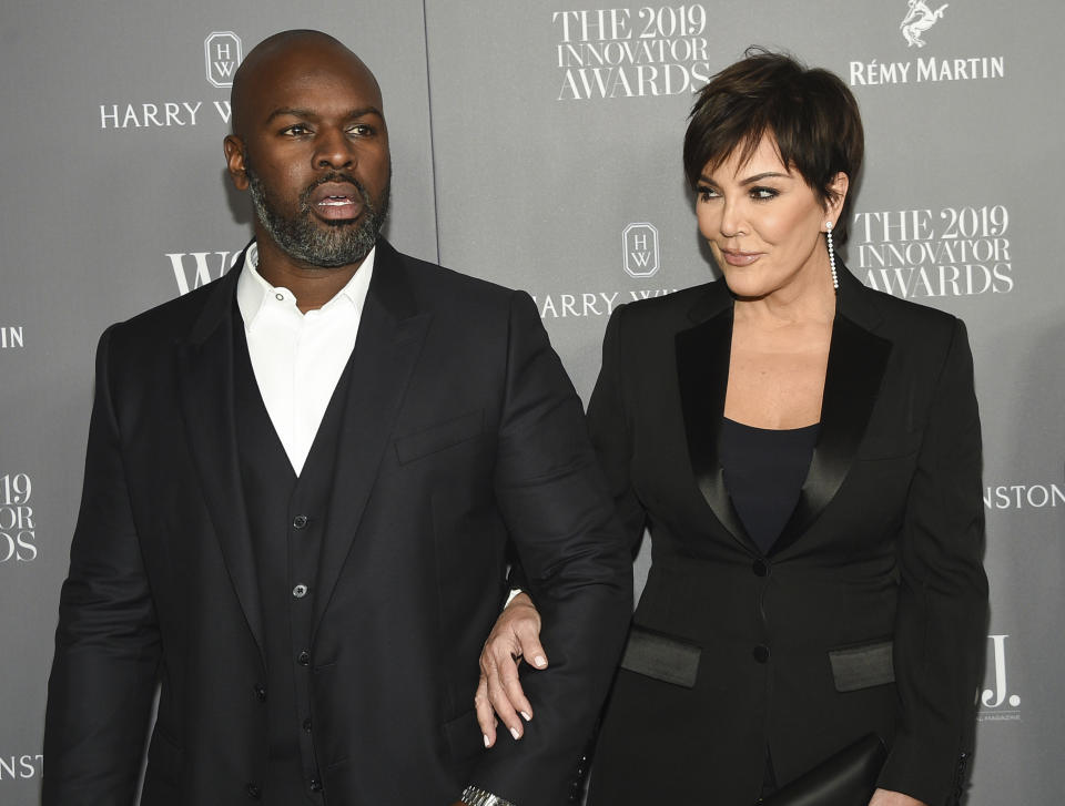 FILE - Corey Gamble, left, and Kris Jenner appear at the WSJ. Magazine 2019 Innovator Awards in New York on Nov. 6, 2019. Gamble testified Wednesday in a lawsuit brought by Blac Chyna against Jenner, Kim Kardashian, Khloé Kardashian and Kylie Jenner alleging they conspired to get her show, “Rob & Chyna,” canceled and ruin her reality TV career. (Photo by Evan Agostini/Invision/AP, File)