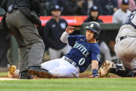 Seattle Mariners' Sam Haggerty scores on a double by Ty France against the New York Yankees during the fifth inning of a baseball game Tuesday, May 30, 2023, in Seattle. (AP Photo/Caean Couto)