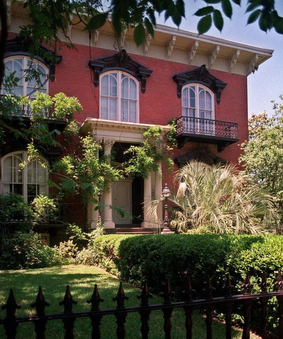FILE- This May 2, 1997 file photo shows The Mercer House, located in historic Savannah, Ga., and is the former home of the late antiques dealer Jim Williams whose story was the subject of author John Berent's book "Midnight in the Garden of Good and Evil." (AP Photo/Savannah News-Press, File)