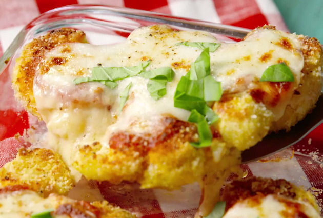 <p>Keep your beach bod in tact by lightening up your comfort food faves.</p><p>Get the recipe from <a href="/cooking/recipe-ideas/recipes/a48381/cauliflower-parm-recipe/" data-ylk="slk:Delish;elm:context_link;itc:0;sec:content-canvas" class="link ">Delish</a>.</p>