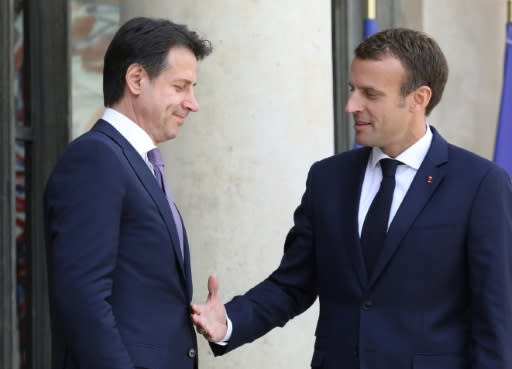 French President Emmanuel Macron welcomes new Italian Prime Minister Giuseppe Conte to the Elysee Palace in Paris ahead of talks on Friday