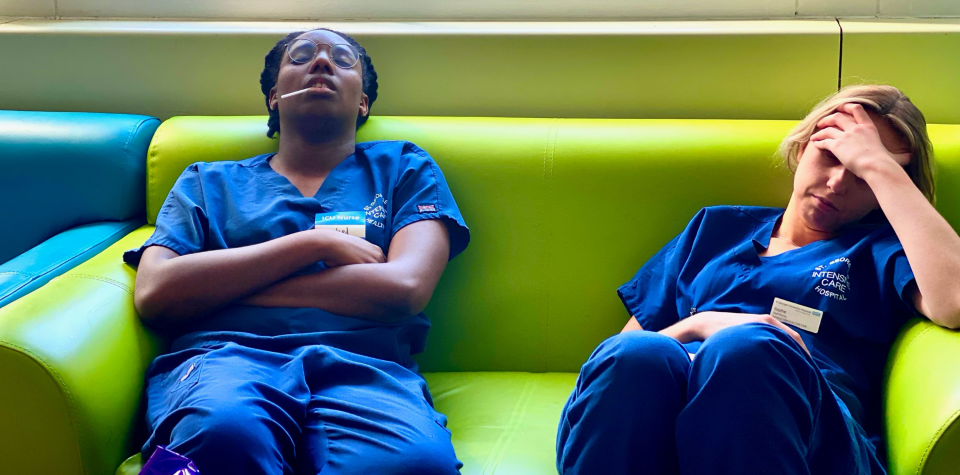 Two NHS staff take a break during a busy shift. (Kensington Palace)