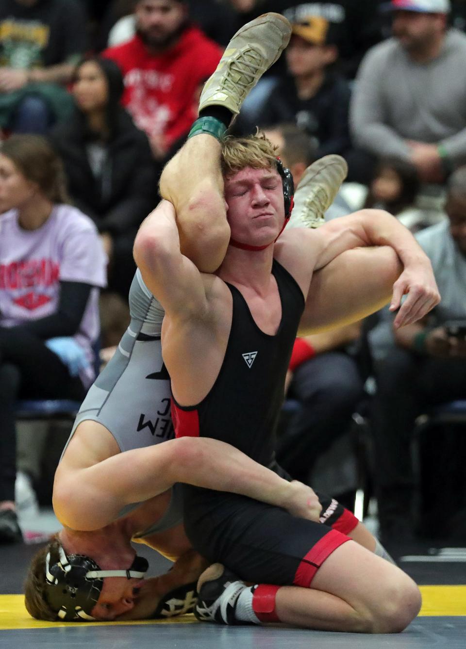 Jaxon Joy of Wadsworth, right, wrestles Kollin Rath of Bethlehem Catholic, Pa. during their 150-pound match for third place at the Ironman.