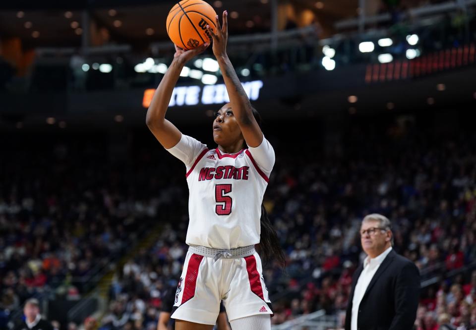 Mar 28, 2022; Bridgeport, CT, USA; NC State Wolfpack forward Jada Boyd (5) shoots against the UConn Huskies during the first half in the Bridgeport regional finals of the women's college basketball NCAA Tournament at Webster Bank Arena. Mandatory Credit: David Butler II-USA TODAY Sports