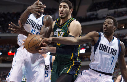 Enes Kanter (center) is looking for a trade from the Jazz. (USA Today)