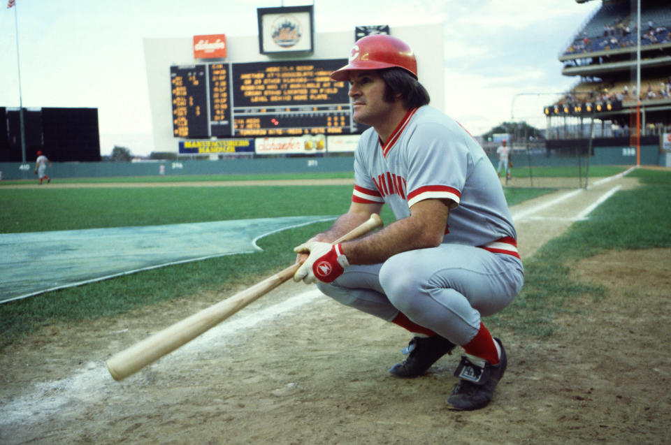 Rose crouches on the field before a game at Shea Stadium in 1978. (Gary Gershoff/Getty Images)