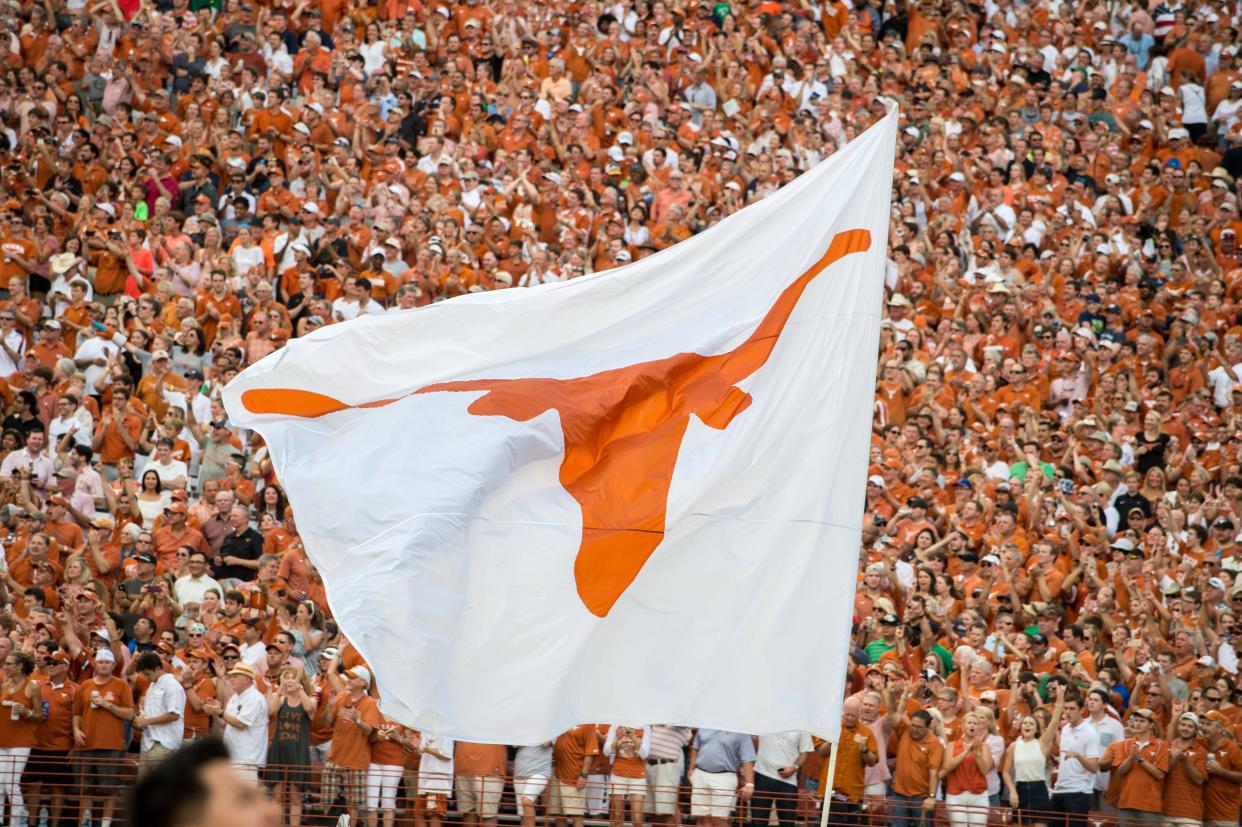 Sep 4, 2016; Austin, TX, USA; The Texas Longhorns logo flag flies during the game between the Texas Longhorns and the Notre Dame Fighting Irish at Darrell K. Royal-Texas Memorial Stadium. Texas won 50-47 in double overtime.