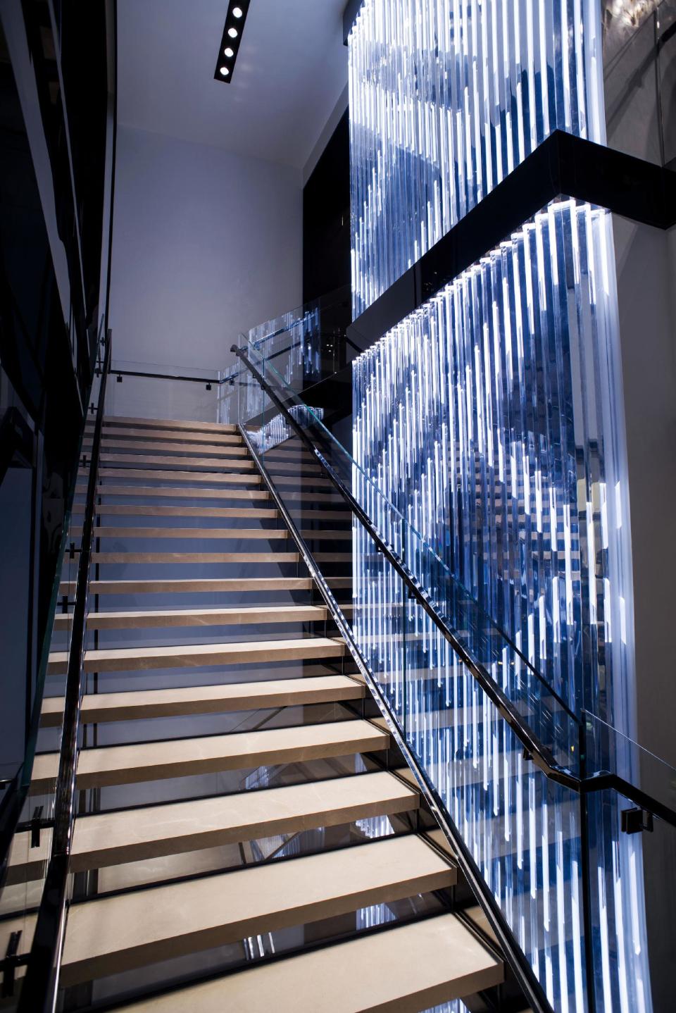 This undated publicity photo provided by BURBERRY shows an interior staircase of the new BURBERRY Flagship store opened in November 2012 on Michigan Avenue in Chicago. BURBERRY has been known for generations for its signature check pattern and trenchcoat. (AP Photo/BURBERRY)