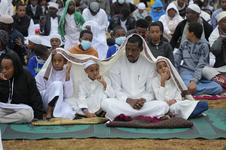 Muslims gather for prayers to celebrate Eid al-Adha, or Feast of Sacrifice, that commemorates the Prophet Ibrahim's faith, in Nairobi, Kenya, Saturday, July, 9, 2022. Eid al-Adha marks the end of hajj. (AP Photo/Sayyid Abdul Azim)