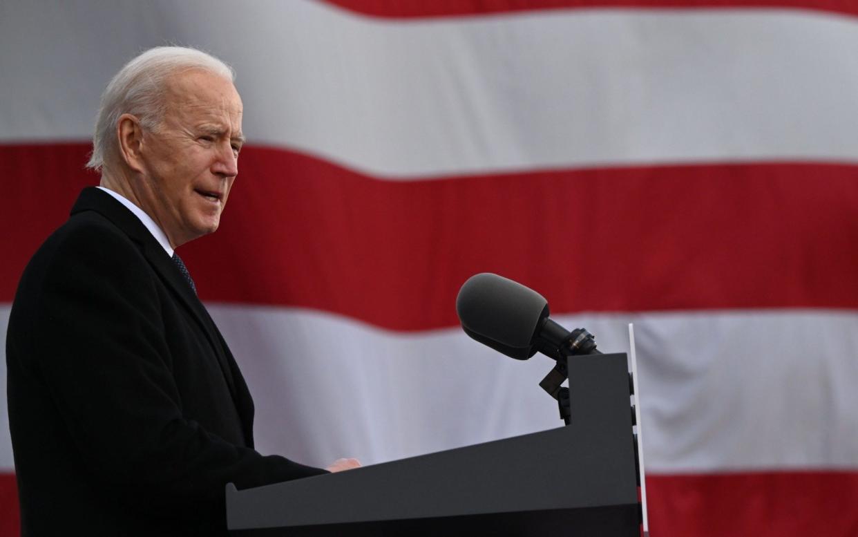 Joe Biden plans to kick off his new administration with executive orders to restore the United States to the Paris climate accord and the World Health Organization - JIM WATSON/AFP via Getty Images