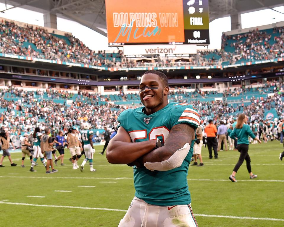 Miami middle linebacker Raekwon McMillan reacts after the Dolphins defeated the Philadelphia Eagles at Hard Rock Stadium in December 2019.