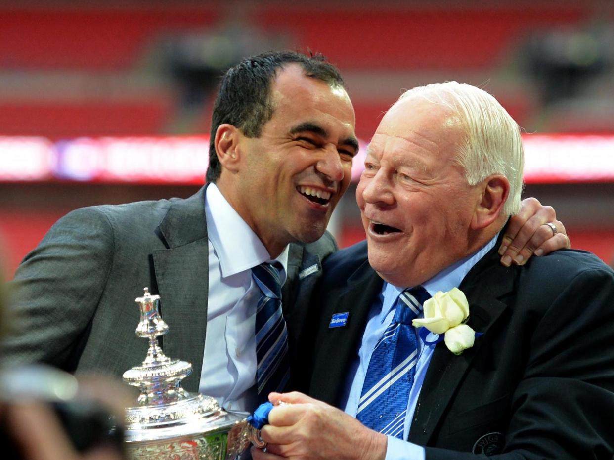 Roberto Martinez (left) with former Wigan owner Dave Whelan after the club's FA Cup triumph in 2013: Getty Images