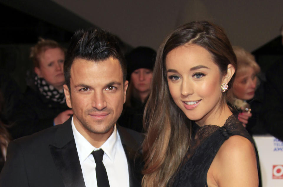 Peter Andre, left, and Emily Macdonagh seen at the National Television Awards at the o2 Arena on Wednesday, Jan. 23, 2013, in London. (Photo by Joel Ryan/Invision/AP)