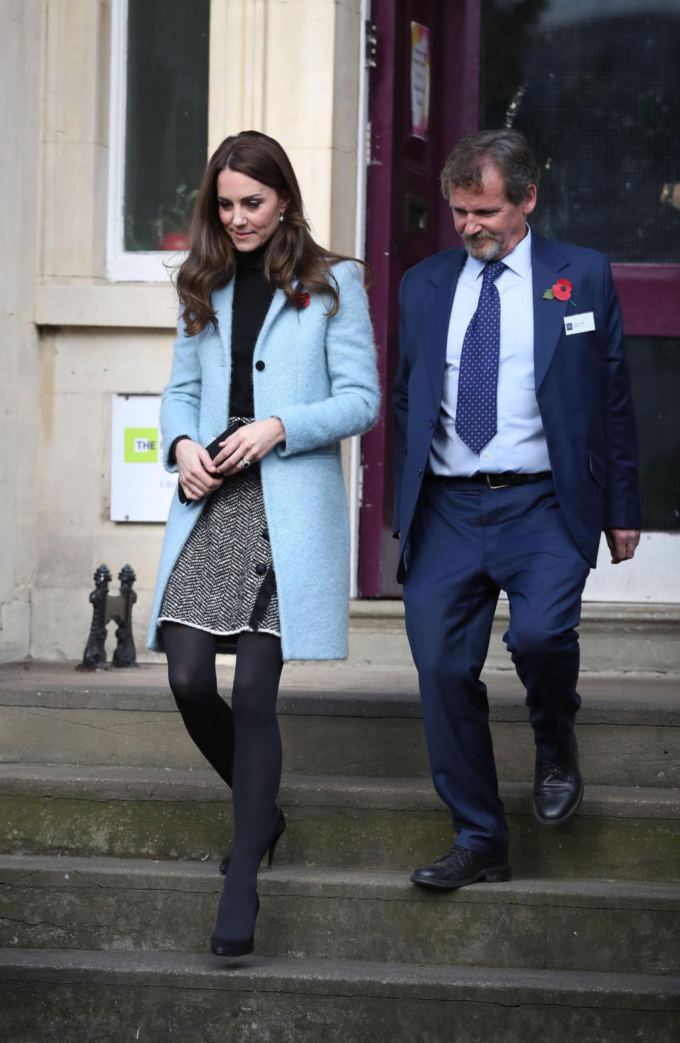 <p>On a visit to a women’s centre, the Duchess proved that it’s definitely time to start wearing tights. Wrapping up in a duck egg blue coat by Mulberry, she paired the cosy look with a printed Dolce & Gabbana skirt and simple black turtleneck. </p><p><i>[Photo: PA]</i></p>