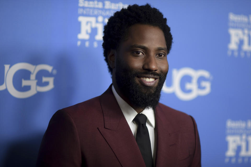 FILE - In this Tuesday, Feb. 5, 2019, file photo, John David Washington attends the the 2019 Santa Barbara International Film Festival Virtuosos Tribute in Santa Barbara, Calif. More than $5.1 million in funds were given to over 70 nonprofit organizations during the “HFPA Philanthropy: Empowering the Next Generation” virtual event on Tuesday, Oct. 13, 2020. Washington was among the entertainers who appeared to discuss the charities that benefit from HFPA grants. (Photo by Richard Shotwell/Invision/AP, File)