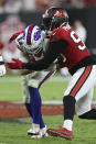 Tampa Bay Buccaneers linebacker Jason Pierre-Paul (90) sacks Buffalo Bills quarterback Josh Allen (17) during the second half of an NFL football game Sunday, Dec. 12, 2021, in Tampa, Fla. (AP Photo/Mark LoMoglio)