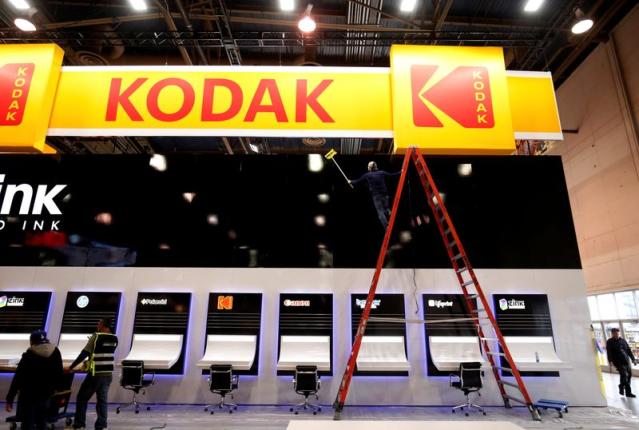 Two plead guilty to insider trading in Kodak before Trump loan