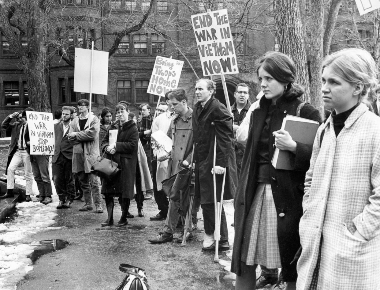 PHOTO: A protest against the Vietnam War takes place in Harvard Yard on the Harvard University campus in Cambridge, MA, Feb. 11, 1966.   (Charles Dixon/Boston Globe via Getty Images)
