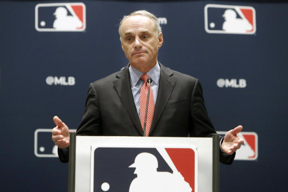 FILE - In this Nov. 21, 2019, file photo, baseball commissioner Rob Manfred speaks to the media at the owners meeting in Arlington, Texas. Pitchers will be ejected and suspended for 10 games for using illegal foreign substances to doctor baseballs in a crackdown by Major League Baseball that will start June 21. The commissioner’s office, responding to record strikeouts and a league batting average at a more than half-century low, said Tuesday, June 15, 2021, that major and minor league umpires will start regular checks of all pitchers, even if opposing managers don’t request inspections.(AP Photo/LM Otero, File)