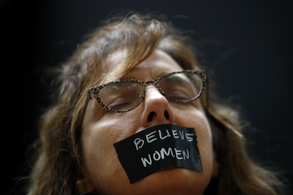 Protesters speak out as Kavanaugh hearing begins