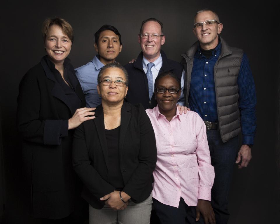 Ophelia Dahl, from top left, Melquiades Huauya Ore, Dr. Paul Farmer, Eric Sawyer, Loune Viaud, bottom left, and Adeline Mercon, bottom right pose for a portrait to promote the film, "Bending the Arc", at the Music Lodge during the Sundance Film Festival on Sunday, Jan. 22, 2017, in Park City, Utah. (Photo by Taylor Jewell/Invision/AP)