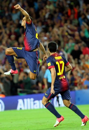 Barcelona's Adriano Correia celebrates scoring a goal during their Spanish La Liga match vs Valencia, on September 2, at Camp Nou stadium in Barcelona. Barca go to a Getafe side next, on Saturday