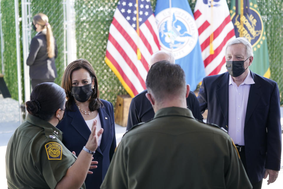 FILE - Vice President Kamala Harris talks to Gloria Chavez, Chief Patrol Agent of the El Paso Sector, as she tours the U.S. Customs and Border Protection Central Processing Center, June 25, 2021, in El Paso, Texas, with Sen. Dick Durbin, D-Ill., right. (AP Photo/Jacquelyn Martin, File)