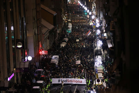 Demonstrators march during a protest against Serbian President Aleksandar Vucic and his government in central Belgrade, Serbia, January 12, 2019. REUTERS/Djordje Kojadinovic