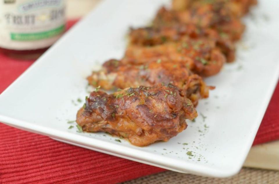 <p>Mommy Hates Cooking</p><p>Love spicy and sweet? Let your crockpot make the perfect wings. </p><p><strong>Get the Recipe: <a href="https://www.mommyhatescooking.com/slow-cooker-strawberry-jalapeno-bbq-wings" rel="nofollow noopener" target="_blank" data-ylk="slk:Slow Cooker Strawberry Jalapeno Wings;elm:context_link;itc:0;sec:content-canvas" class="link ">Slow Cooker Strawberry Jalapeno Wings</a></strong></p>