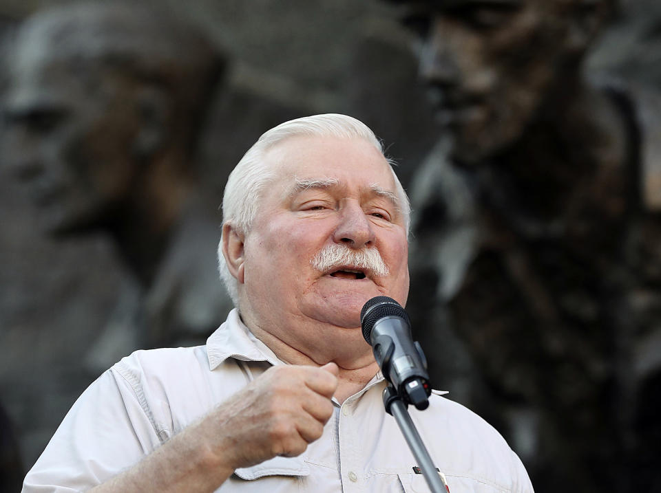 In this July 4, 2018 file photo Poland's pro-democracy champion and former president Lech Walesa addresses a crowd of right-wing government opponents in Warsaw, Poland. On Sunday, Sept, 2, 2018 Walesa said that Poland's current government and the ruling right-wing Law and Justice party are harming Poland's interests and should be ousted from power in Oct. 21 local elections and other votes until 2020. (AP Photo/Czarek Sokolowski, file)