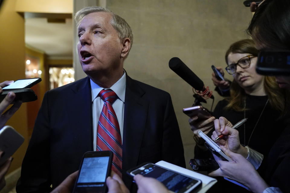 Sen. Lindsey Graham (R-SC) speaks to reporters Tuesday as he leaves a closed-door Senate Republican caucus meeting after the Senate adjourned for the day during the impeachment trial. (Photo: Drew Angerer via Getty Images)